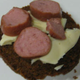 Illustration for article titled Taste Test: Canned bread, canned cheese, pickled sausage